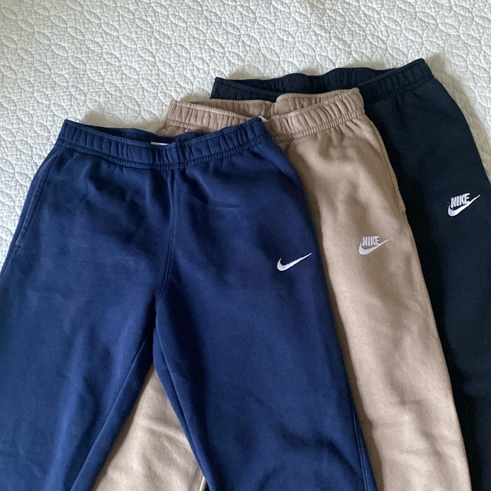 Nike joggers bundle - men’s small in navy, tan, black.  All in EUC.